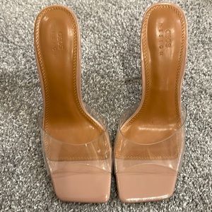 Cute Clear slip in heel. Worn once.